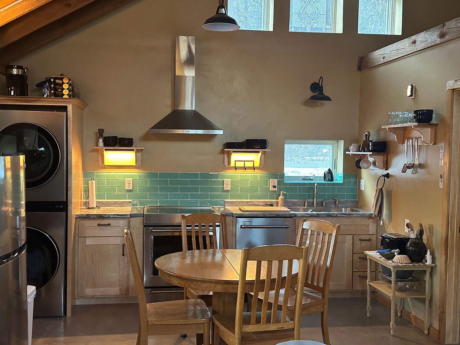 Full kitchen with washer and dryer